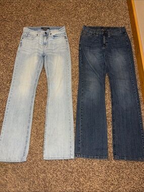 2 pairs of like new Cody James jeans.